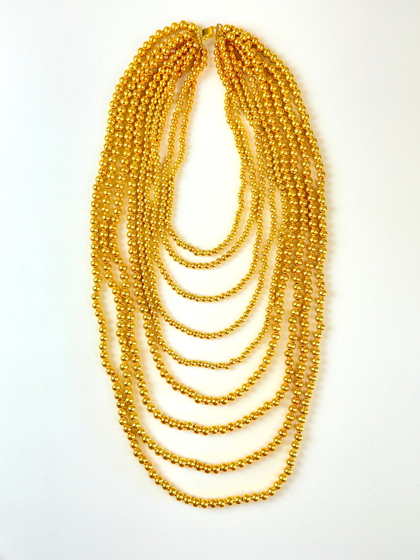 COLLAR CUENTAS DORADAS
